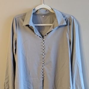 Grey long sleeve blouse with faux pearl button